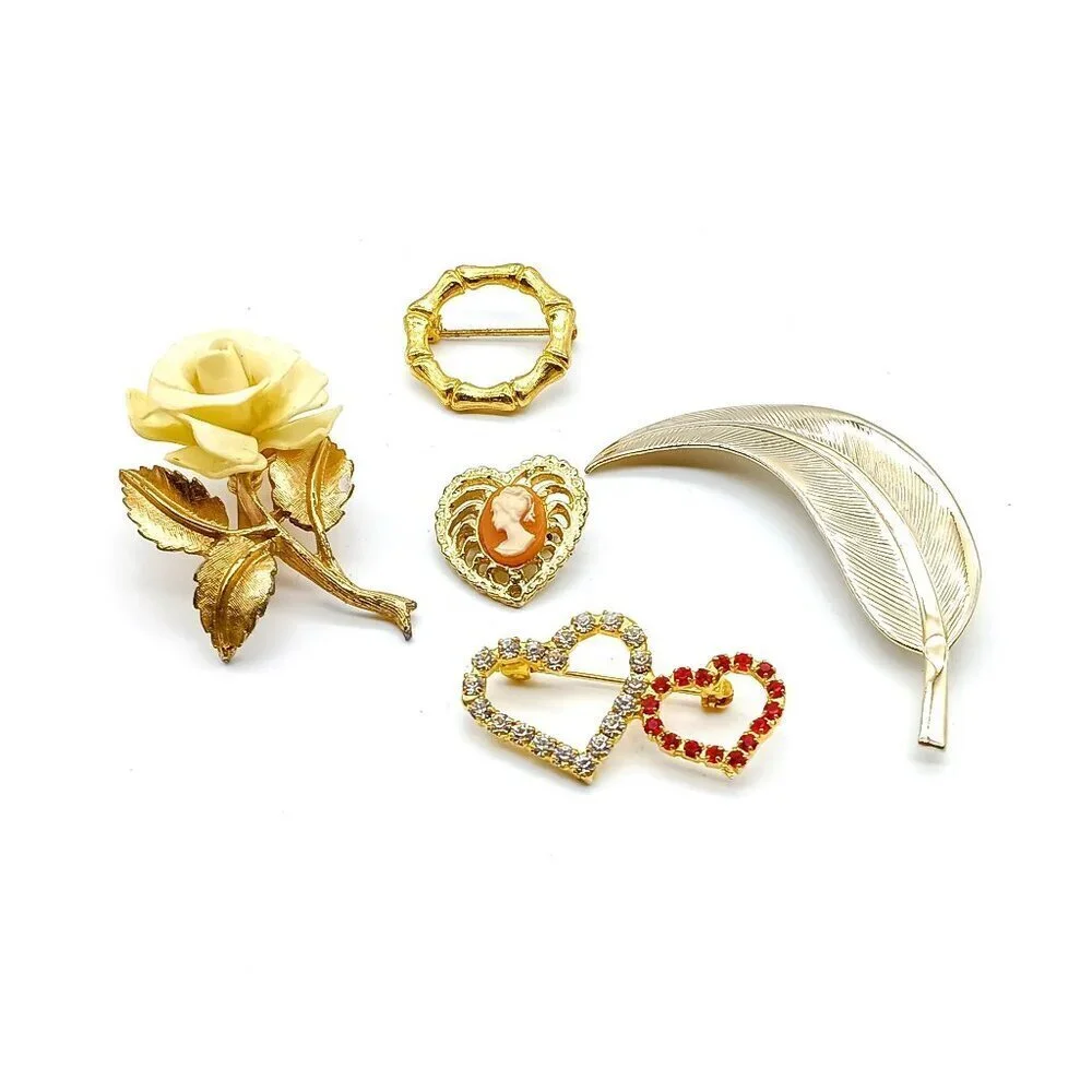 Elegant Gold and Silver Brooch Set